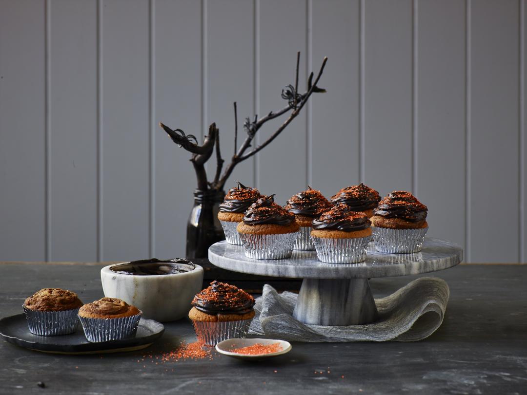 Vanilla-Hazelnut Cupcakes with Black Chocolate Cream Cheese Frosting