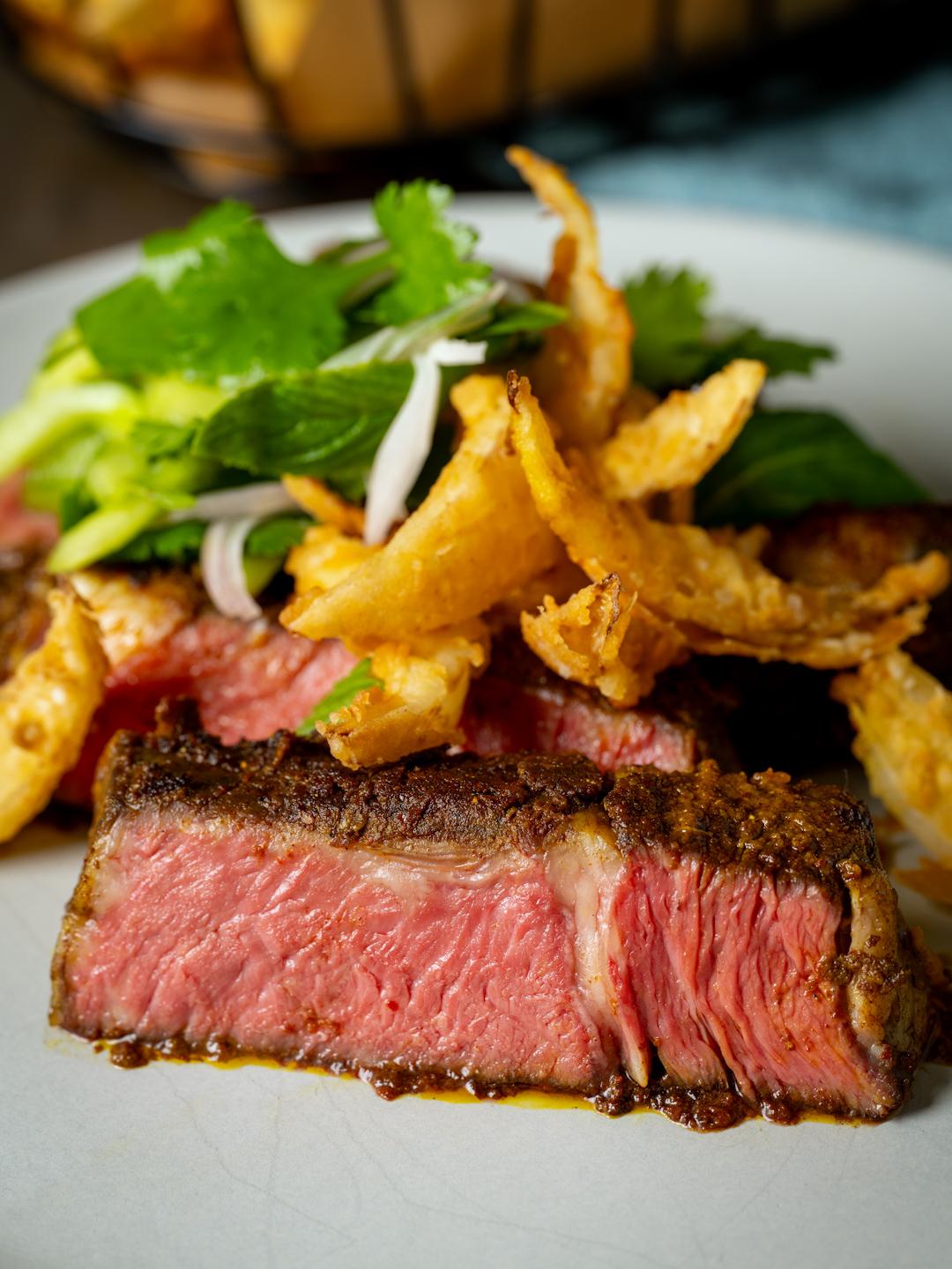 Turbo Ribeye with Spice Rub and Onion Frites